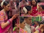 Shloka Mehta, in a gorgeous floral saree, does Anant Ambani and Radhika Merchant's tilak ceremony. (Instagram) Shloka Mehta, in a gorgeous floral saree, does Anant Ambani and Radhika Merchant's tilak ceremony. (Instagram)