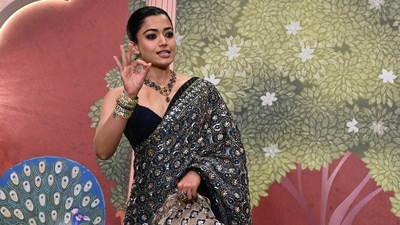 Rashmika Mandana chats with the paparazzi on the red carpet. Rashmika Mandana chats with the paparazzi on the red carpet.