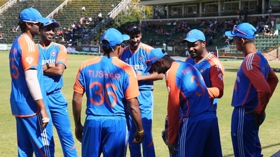 Indian players gather before the T20 cricket match between Zimbabwe and India at the Harare Sports club, in Harare (AP)