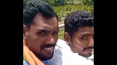 The image shows the two men who were recording while riding a bike. UP Police shared the video. (Screengrab) The image shows the two men who were recording while riding a bike. UP Police shared the video. (Screengrab)