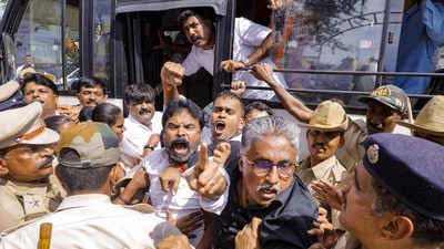 BJP leaders being detained during a protest against alleged fraudulent allotment of sites to land losers by Mysuru Urban Development Authority, which involves plots given to Karnataka Chief Minister Siddaramaiah's wife, in Mysuru. (PTI) BJP leaders being detained during a protest against alleged fraudulent allotment of sites to land losers by Mysuru Urban Development Authority, which involves plots given to Karnataka Chief Minister Siddaramaiah's wife, in Mysuru. (PTI)