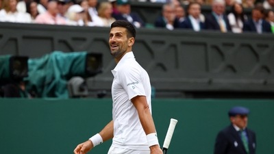 Serbia's Novak Djokovic reacts during his semi final match against Italy's Lorenzo Musetti (REUTERS)