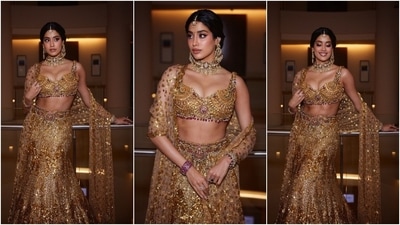 Janhvi Kapoor's custom Falguni Shane Peacock gold lehenga set features a bralette-style blouse, a mermaid-silhouette lehenga skirt, and a matching dupatta. Celebrity stylist Tanya Ghavri styled Janhvi's look with the assistance of Marce Pedrozo and Anil C for her hair and makeup. (Instagram) Janhvi Kapoor's custom Falguni Shane Peacock gold lehenga set features a bralette-style blouse, a mermaid-silhouette lehenga skirt, and a matching dupatta. Celebrity stylist Tanya Ghavri styled Janhvi's look with the assistance of Marce Pedrozo and Anil C for her hair and makeup. (Instagram)