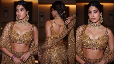 Janhvi styled the bralette and lehenga set with a sequins-adorned dupatta, a choker necklace, matching earrings, mang tika, bracelets, and rings. Lastly, she chose winged eyeliner, gold eye shadow, caramel lips, feathered brows, a dainty bindi, rouge-tinted cheeks, and a centre-parted braided hairdo adorned with gold hair accessories to glam up the look. (Instagram) Janhvi styled the bralette and lehenga set with a sequins-adorned dupatta, a choker necklace, matching earrings, mang tika, bracelets, and rings. Lastly, she chose winged eyeliner, gold eye shadow, caramel lips, feathered brows, a dainty bindi, rouge-tinted cheeks, and a centre-parted braided hairdo adorned with gold hair accessories to glam up the look. (Instagram)