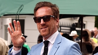 Damian Lewis looked smart in a pale blue suit and dark sunglasses. Damian Lewis looked smart in a pale blue suit and dark sunglasses.