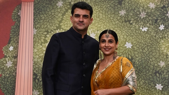 Vidya Balan and Siddharth Roy Kapoor attending the blessings ceremony.
