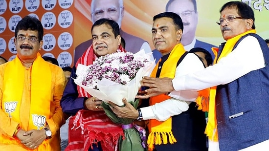 Union minister Nitin Gadkari being felicitated by Goa chief minister Pramod Sawant and Union minister of state Shripad Y. Naik during the BJP Goa state executive meeting, in Taleigao on Friday. (ANI)