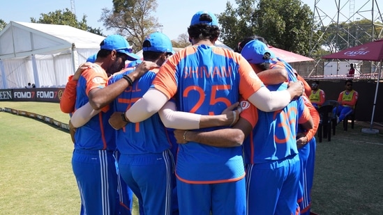 Indian players gather before the T20 cricket match between Zimbabwe and India at the Harare Sports club, in Harare(AP)