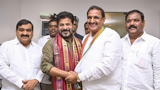 Telangana chief minister Revanth Reddy greets BRS MLA from Serilingampally Arekapudi Gandhi as the latter joins the Congress, in Hyderabad, on Saturday. (PTI)