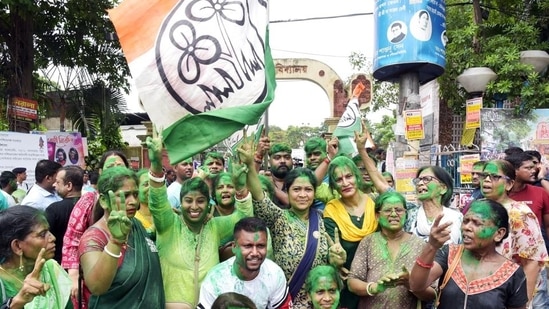 Trinamool Congress (TMC) supporters celebrate the victory of the party candidate for the Maniktala assembly constituency on Saturday. (ANI)