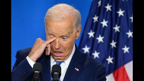 US President Joe Biden wipes his eye as he speaks during a press conference at the close of the 75th NATO Summit at the Walter E. Washington Convention Center in Washington, DC on July 11, 2024. (Photo by Mandel NGAN / AFP) (AFP)