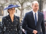 Kate Middleton stuns in a black peplum skirt and blazer adored with white floral prints.(Instagram)