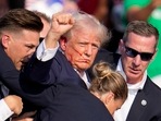 Republican presidential candidate former President Donald Trump is helped off the stage by U.S. Secret Service agents at a campaign event in Butler, Pa., on Saturday, July 13, 2024. (AP) Republican presidential candidate former President Donald Trump is helped off the stage by U.S. Secret Service agents at a campaign event in Butler, Pa., on Saturday, July 13, 2024. (AP)