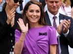 Kate was wearing a purple dress — one of Wimbledon's official colours. (AP)