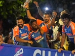 The T20 World Cup-winning Indian cricket team captain Rohit Sharma with players Sanju Samson, Axar Patel, Shivam Dube and others during their open bus victory parade, in Mumbai(PTI) The T20 World Cup-winning Indian cricket team captain Rohit Sharma with players Sanju Samson, Axar Patel, Shivam Dube and others during their open bus victory parade, in Mumbai(PTI)