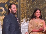 The image shows Radhika Merchant and Anant Ambani's first looks from reception. The image shows Radhika Merchant and Anant Ambani's first looks from reception.
