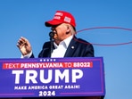 Photo by New York Times photographer Doug Mills shows a bullet flying just behind Trump's head.(New York Times)