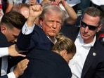 Republican candidate Donald Trump is seen with blood on his face surrounded by Secret Service agents as he is taken off the stage at a campaign event at Butler Farm Show Republican candidate Donald Trump is seen with blood on his face surrounded by Secret Service agents as he is taken off the stage at a campaign event at Butler Farm Show