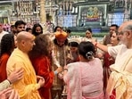 Parmarth Niketan President Swami Chidanand Saraswati gives blessings to the newly wedded couple Anant Ambani and Radhika Merchant during the 'Shubh Aashirwad' ceremony, at Jio World Centre, in Mumbai on Saturday.
