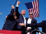 Republican presidential candidate former President Donald Trump gestures as he is surrounded by U.S. Secret Service agents as he leaves the stage at a campaign rally, Saturday, July 13, 2024, in Butler, Pa.(AP) Republican presidential candidate former President Donald Trump gestures as he is surrounded by U.S. Secret Service agents as he leaves the stage at a campaign rally, Saturday, July 13, 2024, in Butler, Pa.(AP)