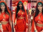 Kim Kardashian attends Day 2 of Ambani wedding in a sultry red look and emerald jewels. 