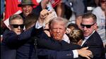 Former US President Donald Trump being assisted by the Secret Service after he was shot at a campaign rally in Pennsylvania on Saturday evening. (REUTERS) Former US President Donald Trump being assisted by the Secret Service after he was shot at a campaign rally in Pennsylvania on Saturday evening. (REUTERS)