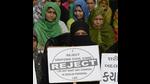 This file photo taken on November 4, 2016 shows Indian Muslim women at a rally to oppose the Uniform Civil Code (UCC) that would outlaw the practice of This file photo taken on November 4, 2016 shows Indian Muslim women at a rally to oppose the Uniform Civil Code (UCC) that would outlaw the practice of