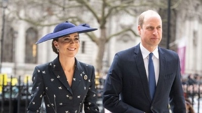 Kate Middleton stuns in a black peplum skirt and blazer adored with white floral prints. (Instagram) Kate Middleton stuns in a black peplum skirt and blazer adored with white floral prints. (Instagram)