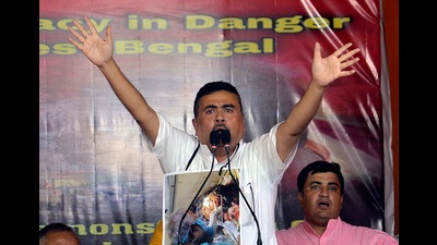 BJP leader Suvendu Adhikari Adhikari staged a sit-in with 300 alleged victims of post-poll violence outside the Raj Bhavan in Kolkata on Sunday. (ANI) BJP leader Suvendu Adhikari Adhikari staged a sit-in with 300 alleged victims of post-poll violence outside the Raj Bhavan in Kolkata on Sunday. (ANI)