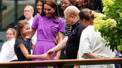 They went to a terrace at the club that is connected to the main stadium by a pedestrian walkway and greeted several people, including 2021 US Open champion Emma Raducanu and other young British tennis players. (AP) They went to a terrace at the club that is connected to the main stadium by a pedestrian walkway and greeted several people, including 2021 US Open champion Emma Raducanu and other young British tennis players. (AP)