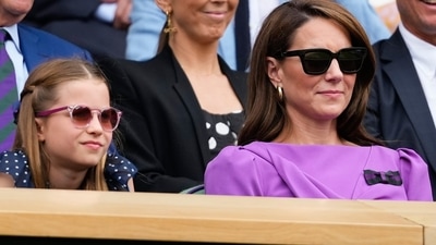 Kate, wife of heir to the throne Prince William, was greeted by a standing ovation from the Centre Court crowd as she took her seat in the Royal Box before the start of the championship match between Novak Djokovic and Carlos Alcaraz. (AP) Kate, wife of heir to the throne Prince William, was greeted by a standing ovation from the Centre Court crowd as she took her seat in the Royal Box before the start of the championship match between Novak Djokovic and Carlos Alcaraz. (AP)