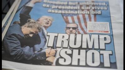 Copies of daily newspapers featuring front page articles about the shooting at former US President Donald Trump's campaign event, in the Brooklyn borough of New York, US, on Sunday, July 14, 2024. Trump confirmed that he will be attending the Republican National Convention next week, hours after he was shot at a campaign rally in Pennsylvania. Photographer: Stephanie Keith/Bloomberg (Bloomberg) Copies of daily newspapers featuring front page articles about the shooting at former US President Donald Trump's campaign event, in the Brooklyn borough of New York, US, on Sunday, July 14, 2024. Trump confirmed that he will be attending the Republican National Convention next week, hours after he was shot at a campaign rally in Pennsylvania. Photographer: Stephanie Keith/Bloomberg (Bloomberg)