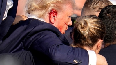 Republican presidential candidate, former President Donald Trump, is helped off the stage by U.S. Secret Service agents at a campaign event in Butler, Pa., on Saturday. (AP Photo/Gene J. Puskar) Republican presidential candidate, former President Donald Trump, is helped off the stage by U.S. Secret Service agents at a campaign event in Butler, Pa., on Saturday. (AP Photo/Gene J. Puskar)