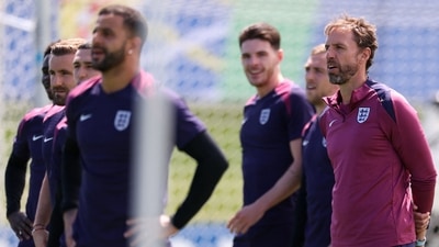 England's head coach Gareth Southgate and his players attend an MD-1 training session at the team's base camp in Blankenhain, on July 13, 2024, on the eve of their UEFA Euro 2024 final football match against Spain. (AFP) England's head coach Gareth Southgate and his players attend an MD-1 training session at the team's base camp in Blankenhain, on July 13, 2024, on the eve of their UEFA Euro 2024 final football match against Spain. (AFP)