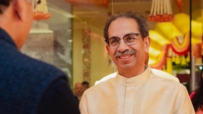 Former Maharashtra Chief Minister and Shiv Sena leader Uddhav Thackeray was seen smiling at the weddng, wearing a white bandhgala for the occasion. Former Maharashtra Chief Minister and Shiv Sena leader Uddhav Thackeray was seen smiling at the weddng, wearing a white bandhgala for the occasion.