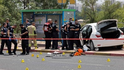 Israeli police shot dead a car driver supected of ramming into pedestrians waiting at a bus stop in a town on Sunday and injured four people, a spokesman said. (AFP)