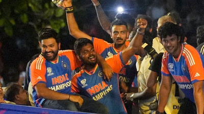 The T20 World Cup-winning Indian cricket team captain Rohit Sharma with players Sanju Samson, Axar Patel, Shivam Dube and others during their open bus victory parade, in Mumbai (PTI) The T20 World Cup-winning Indian cricket team captain Rohit Sharma with players Sanju Samson, Axar Patel, Shivam Dube and others during their open bus victory parade, in Mumbai (PTI)