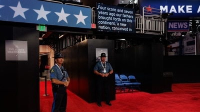 Police officers on the floor of the Fiserv Forum ahead of the Republican National Convention (RNC) in Milwaukee, Wisconsin, US, on Sunday, July 14, 2024. Former President Donald Trump confirmed that he will be attending the Republican National Convention next week, hours after he was shot at a campaign rally in Pennsylvania. Photographer: Hannah Beier/Bloomberg