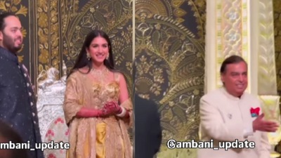 Anant Ambani, Radhika Merchant and Mukesh Ambani at the Mangal Utsav. (Instagram/@ambani_update) Anant Ambani, Radhika Merchant and Mukesh Ambani at the Mangal Utsav. (Instagram/@ambani_update)