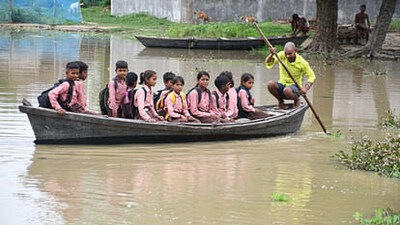 School children rowing boats to reach school in Behrampur village, Gorakhpur (Sourced) School children rowing boats to reach school in Behrampur village, Gorakhpur (Sourced)