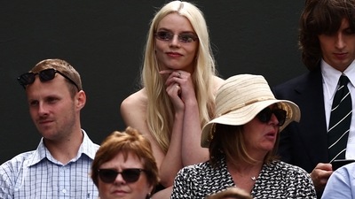 Anya Taylor-Joy seemed involved in the game, reacting as the tennis players scored points during the match. (AFP)