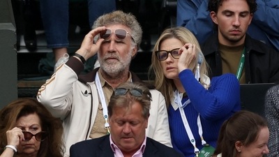 Will Ferrell and his partner Viveca Paulin were seen during the semi final match between Carlos Alcaraz and Daniil Medvedev. (REUTERS)