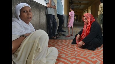 The family members of Riyazuddun at GTB hospital on Sunday. (HT Photo) The family members of Riyazuddun at GTB hospital on Sunday. (HT Photo)