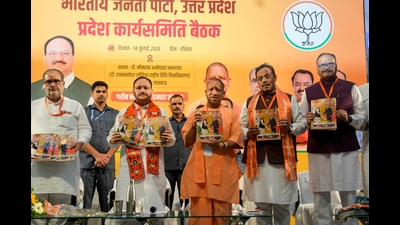 Uttar Pradesh Chief Minister Yogi Adityanath, Union Minister and BJP National President JP Nadda, Deputy Chief Minister Brajesh Pathak, the party’s National General Secretary Vinod Tawde and state BJP President Bhupendra Singh Chaudhary during the party’s state working committee meeting, in Lucknow, Sunday (PTI) Uttar Pradesh Chief Minister Yogi Adityanath, Union Minister and BJP National President JP Nadda, Deputy Chief Minister Brajesh Pathak, the party’s National General Secretary Vinod Tawde and state BJP President Bhupendra Singh Chaudhary during the party’s state working committee meeting, in Lucknow, Sunday (PTI)