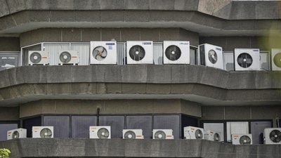 Air conditioners installed at a building near Jhandewalan, in New Delhi (Photo by Biplov Bhuyan/ Hindustan Times) Air conditioners installed at a building near Jhandewalan, in New Delhi (Photo by Biplov Bhuyan/ Hindustan Times)
