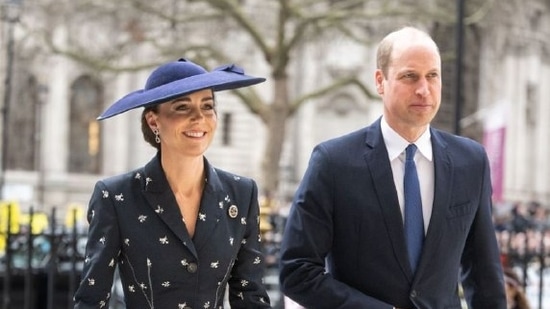 Kate Middleton stuns in a black peplum skirt and blazer adored with white floral prints.(Instagram)