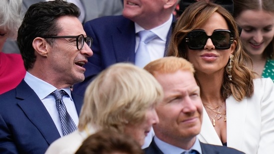 Hugh Jackman and Kate Beckinsale were clicked sitting in the stands and interacting with each other during the tennis match.(AP)