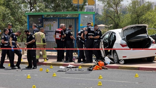 Israeli police shot dead a car driver supected of ramming into pedestrians waiting at a bus stop in a town on Sunday and injured four people, a spokesman said.(AFP)