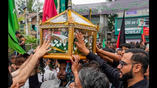 Shia Muslim devotees during a procession on the 7th day of the mourning period of Muharram in Srinagar on Sunday. (PTI)