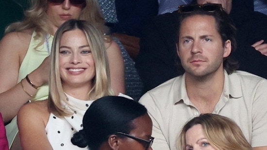 The day before which saw Novak Djokovic and Lorenzo Musetti also saw numerous celebrities like Margot Robbie and her partner Tom Ackerley in the stands.(REUTERS)